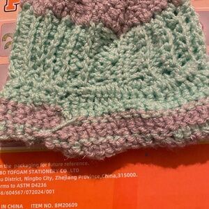 Crocheted baby hat and mittens